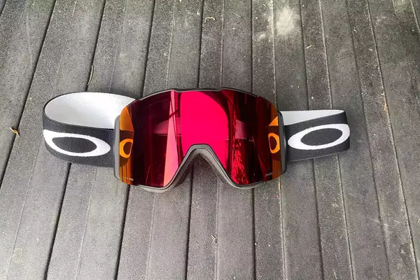 Oakley Line Miner Pro L Snow Goggles on a wooden surface