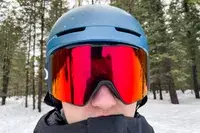 A person wearing the Oakley Line Miner Pro L Snow Goggles while skiing