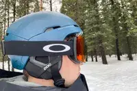A person wearing the Oakley Line Miner Pro L Snow Goggles while skiing