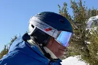 A person wearing the 100 Percent Snowcraft Hiper Goggles while skiing