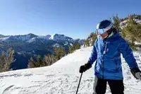 A person wearing the 100 Percent Snowcraft Hiper Goggles while skiing