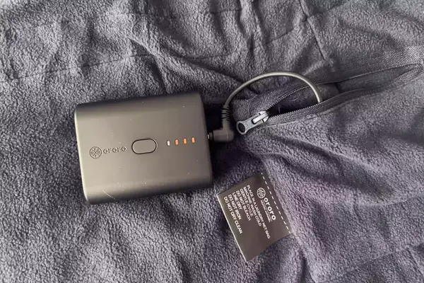 The battery pack and cord for the Ororo Women’s Heated Recycled Fleece Vest