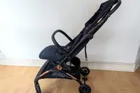 A side view of the Peg Perego Volo Compact Stroller