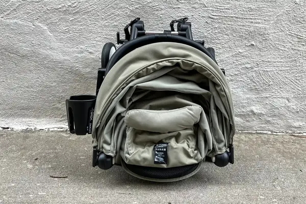 The Stokke YOYO³ Stroller folded on the ground
