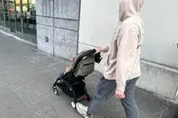 A person pushes a child in the Stokke YOYO³ Stroller