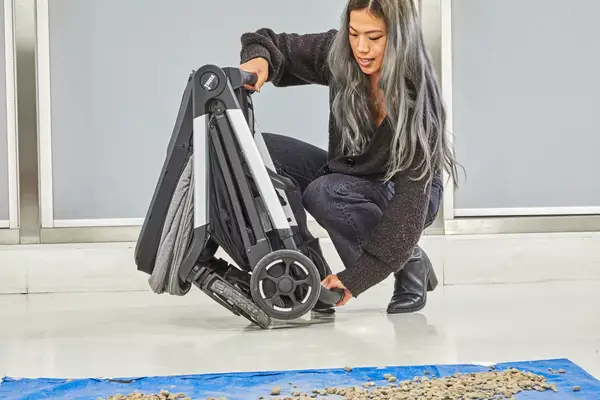A person on the ground assembling the Thule Shine