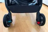 The wheels on the Uppababy Minu V3 Travel Stroller
