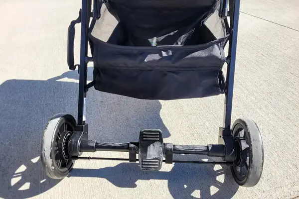 The foot lock on the base of the Inglesina Quid Stroller