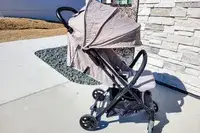 The Inglesina Quid Stroller with the hood open