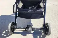 The foot lock on the base of the Inglesina Quid Stroller