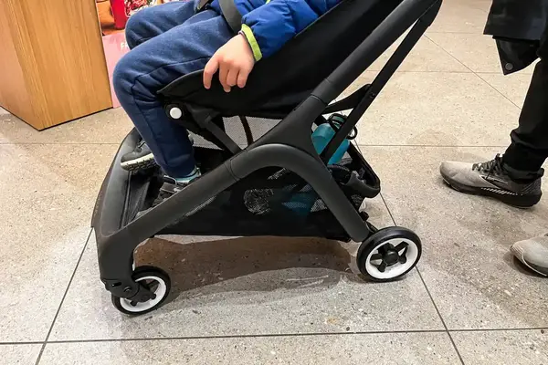 A child sits in the Bugaboo Butterfly Stroller