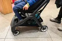 A child sits in the Bugaboo Butterfly Stroller