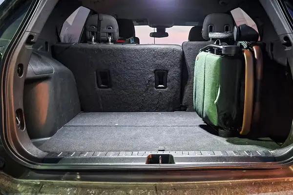 The Bombi Bēbee V2 Lightweight Stroller in the back of a car