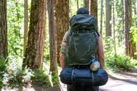 Person with a large Osprey Kestrel 58L Men