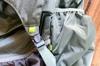 Close-up of a strap and clip mechanism on a Gossamer Gear Mariposa 60 Backpack