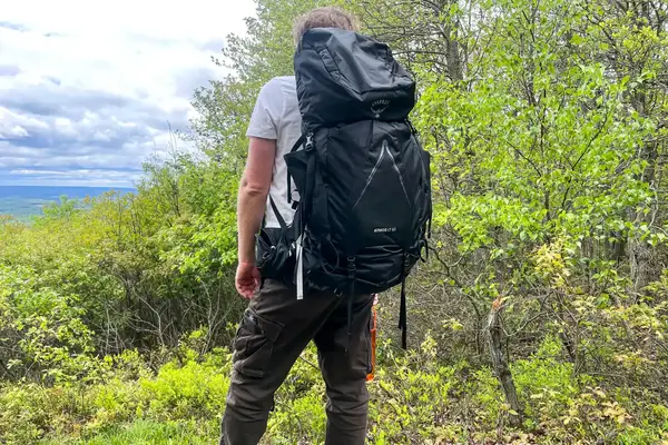 Person outdoors with a Osprey Atmos AG 65 Men