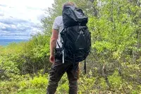 Person outdoors with a Osprey Atmos AG 65 Men