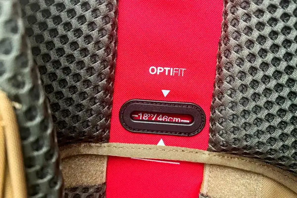 Close-up of a The North Face Trail Lite 50 Backpack back panel with a size adjustment system labeled as Optifit