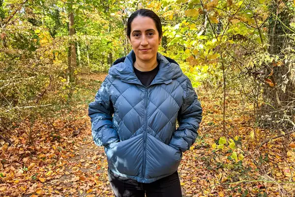 Person wearing Hikerkind Packable Down Puffer 0.1.