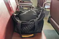 Orvis Pack-And-Go Jacket packed in a bag.