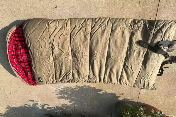 The Guide Gear -30 Sleeping Bag outside on concrete