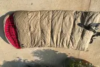 The Guide Gear -30 Sleeping Bag outside on concrete