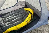The Sea to Summit Spark Down Sleeping Bag inside a tent
