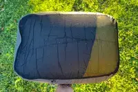 The Sea to Summit Spark Down Sleeping Bag inside a storage bag 