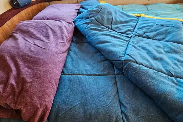 The Coleman Flatlands Fleece 30°F Double Sleeping Bag folded over