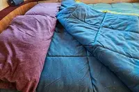 The Coleman Flatlands Fleece 30°F Double Sleeping Bag folded over