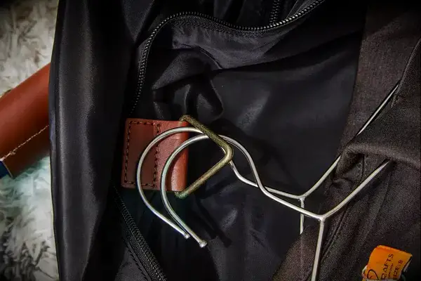 Closeup of garment hanger hook inside the Mark & Graham Commuter 2-in-1 Garment Bag