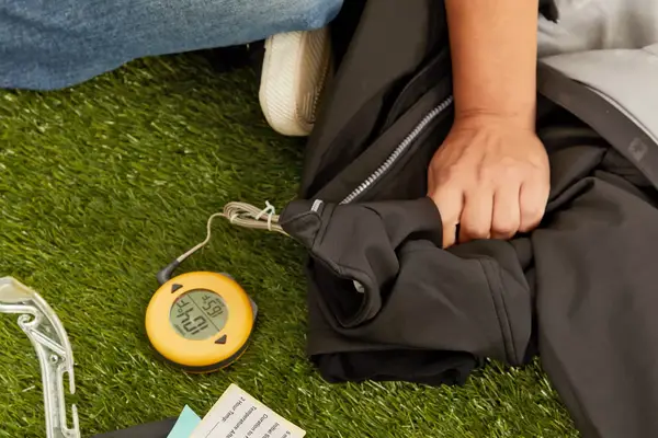 A person facing trees while wearing the Venture Heat Men