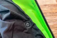 A close-up of the power button of the Conqueco Men