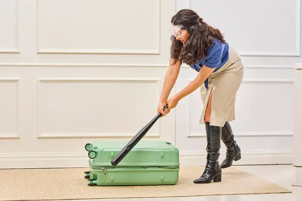 A person hits the Positano Expandable 27-inch Spinner with a bat