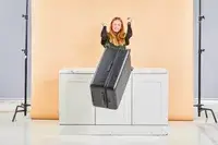 Person pushing the Away The Trunk off a counter