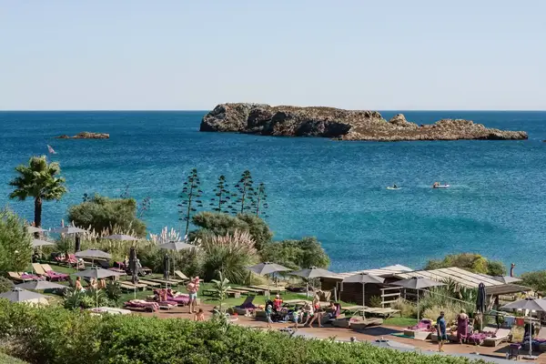 A view of families at a pool at a beach resort in Lisbon, Portugal.