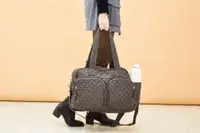 Person carrying the MZ Wallace Nik Duffel