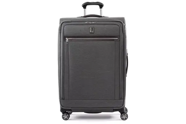 A person unzips the Samsonite 21 Inch Freeform Hardside Expandable Carry-on Spinner