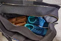 Shoes inside of the Rothyâs The Weekender