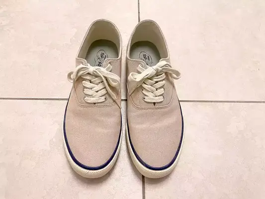 Sperry Unisex Classic CVO Sneakers on a tiled floor