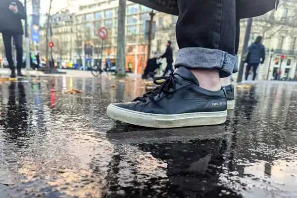 A person wearing the Common Projects Men