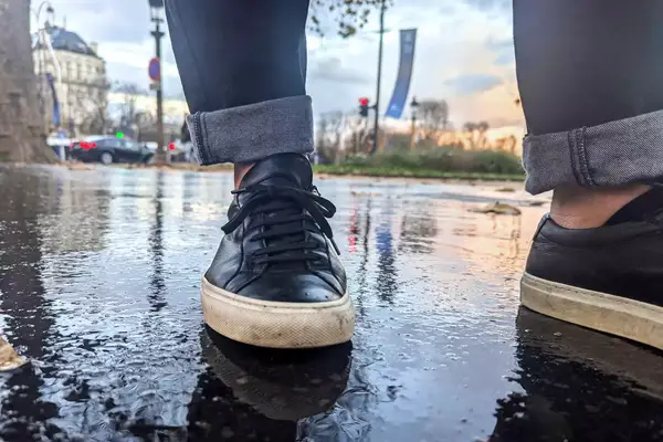 A person wearing the Common Projects Men