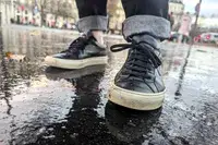 A person wearing the Common Projects Men