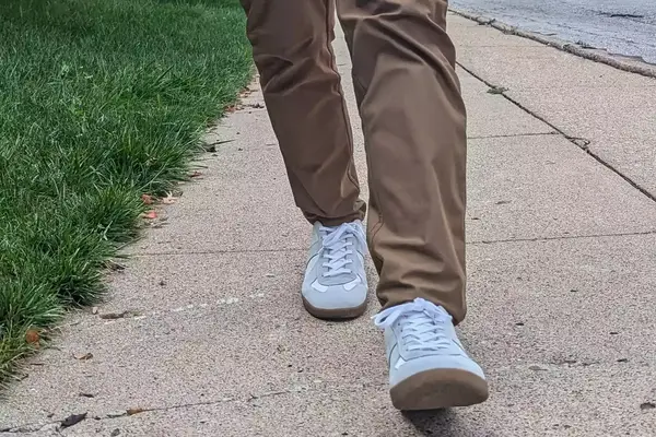 A man walking in the Beckett Simonon Men