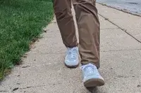 A man walking in the Beckett Simonon Men