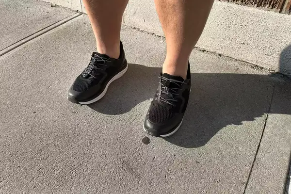 Two legs up close while wearing Kizik Men