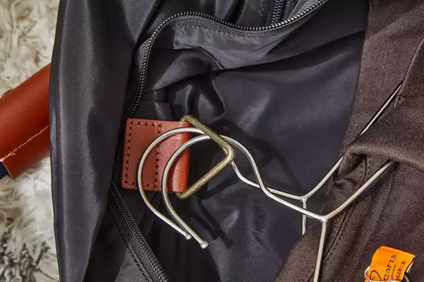Closeup of garment hanger hook inside the Mark & Graham Commuter 2-in-1 Garment Bag