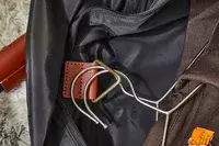 Closeup of garment hanger hook inside the Mark & Graham Commuter 2-in-1 Garment Bag