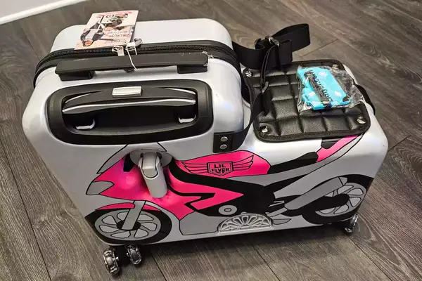 A close-up of the Younglingz Ride On Suitcase