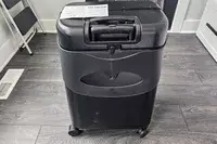 The MiaMily Check In on a wooden floor